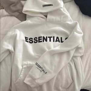 Essentials White Sweater with Bold Text Design